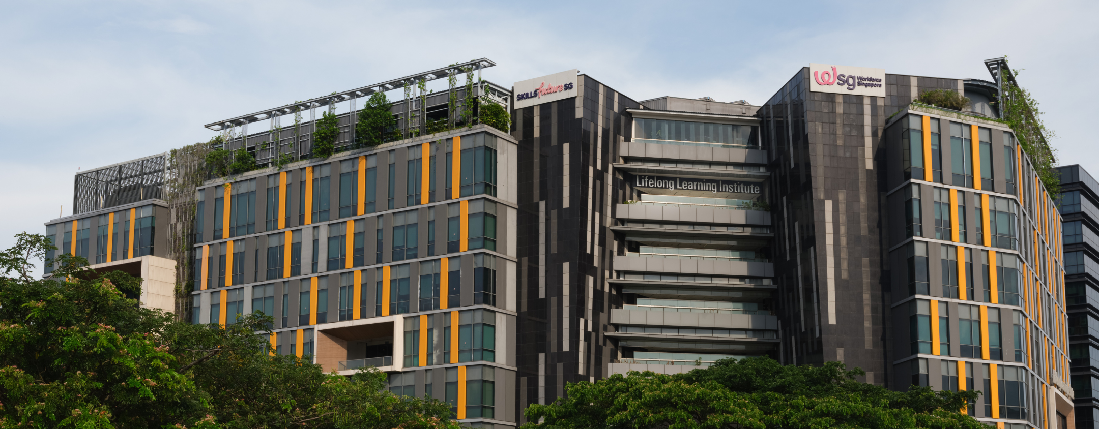 The facade of Lifelong Learning Institute in Paya Lebar, Singapore — a modern adult education hub.